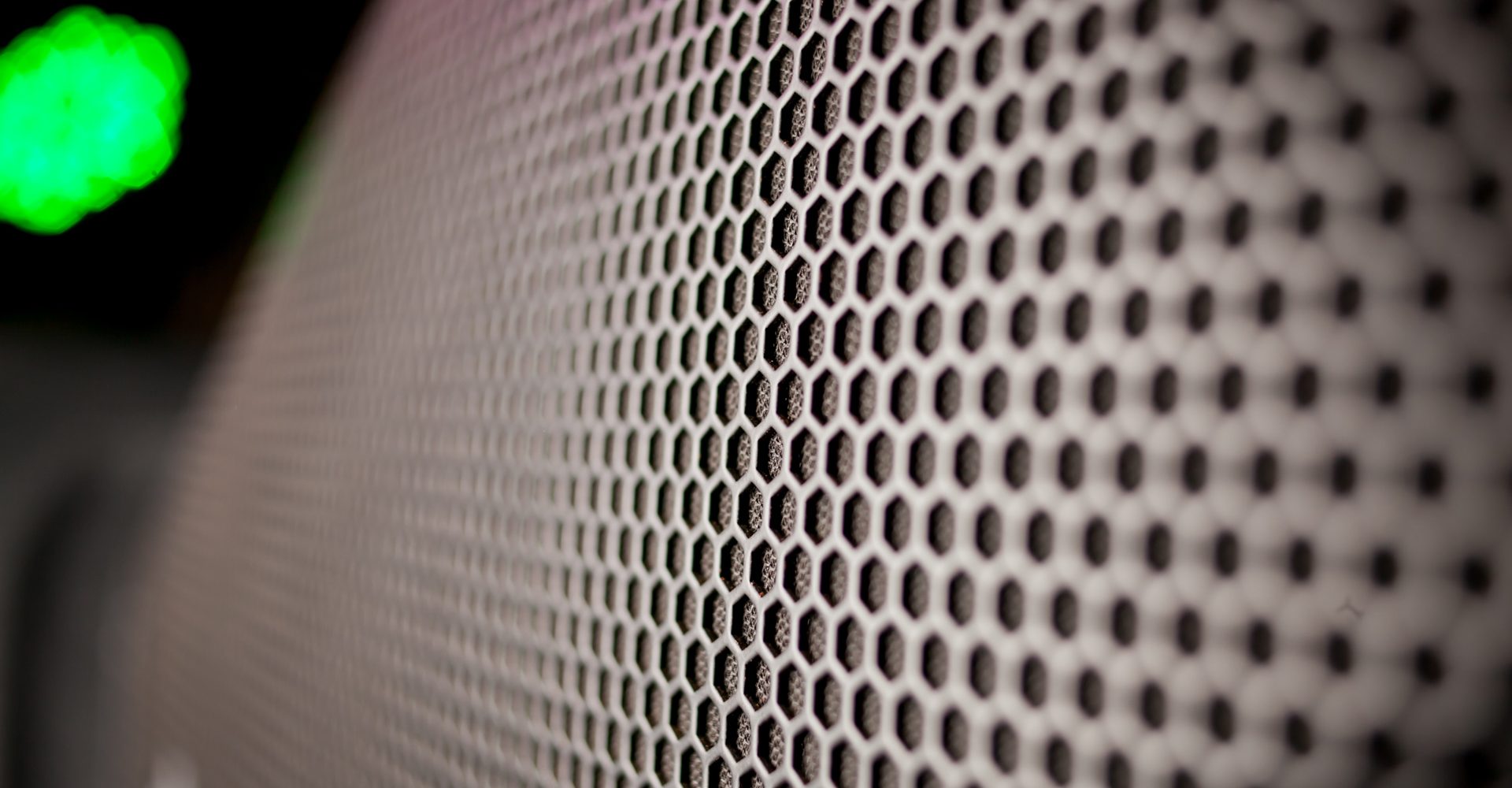 abstract-background-is-a-black-metal-grid-for-the-speaker-closeup-black-iron-speaker-grid-texture